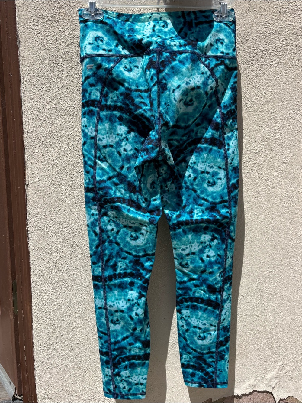 Fabletics Teal Tie-Dye High-Waisted Capri Leggings - Picture 2 of 3